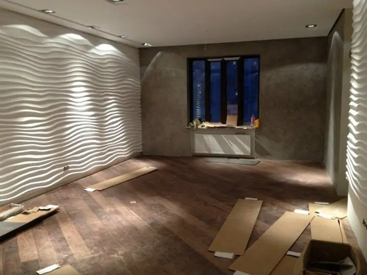 Derived space with white wavy 3D wall panels